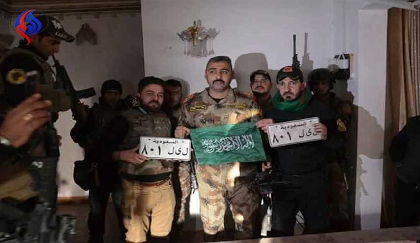 بالصور.. أعلام ولوحات سعودية داخل أحد دور حي الضباط بالموصل 